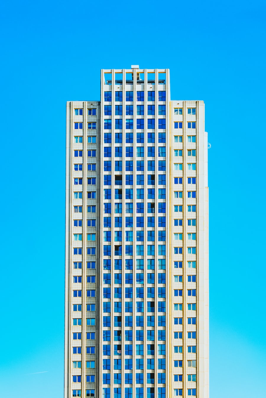 A photo of a high-rise condominium tower with elevator and mechanical systems relevant to equipment breakdown coverage.